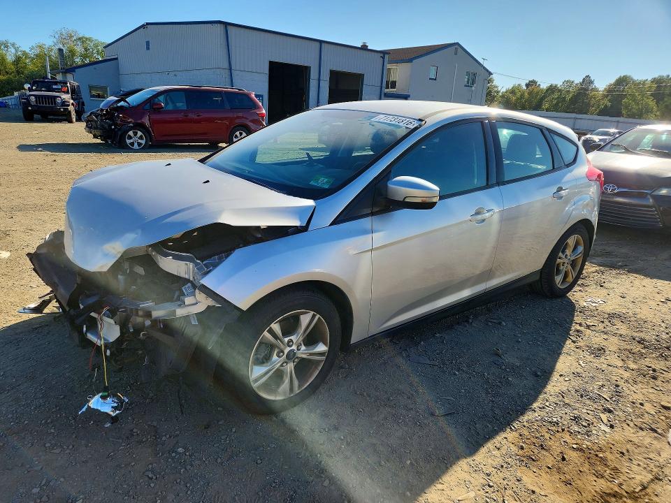 FORD FOCUS 2013 with VIN 1FADP3K21DL299778 - Photo from auction