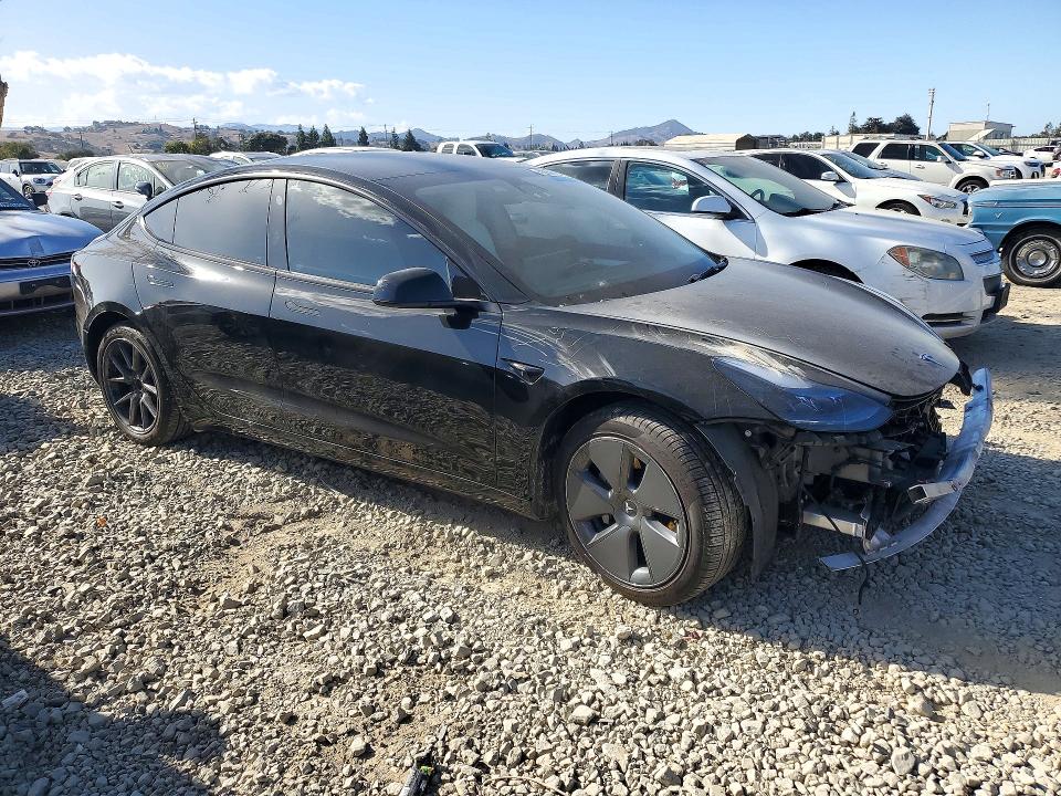 Снимка 4 от търг – 2022 TESLA MODEL 3 с VIN 5YJ3E1EB5NF363112