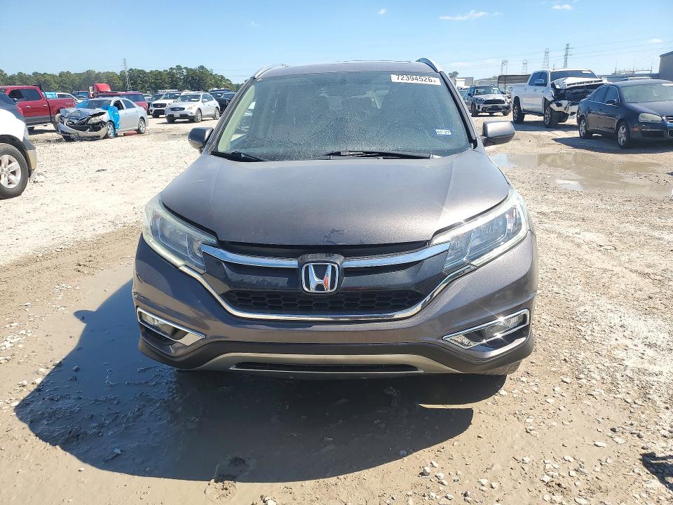 Photo 5 from auction – 2016 HONDA CR-V with VIN 2HKRM4H71GH665801