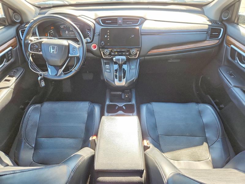Photo 8 from auction – 2018 HONDA CR-V with VIN 7FARW2H82JE102564