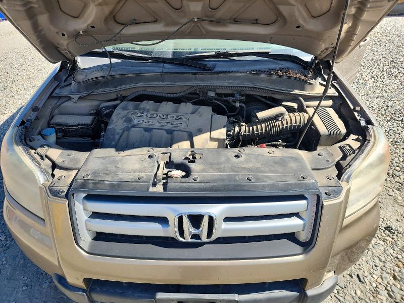 Снимка 12 от търг – 2007 HONDA PILOT с VIN 5FNYF185X7B013034