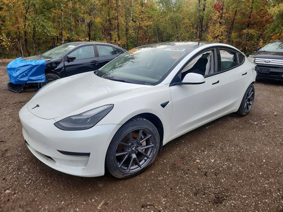 TESLA MODEL 3 2023 с VIN 5YJ3E1EA5PF399912 - Снимка от търг