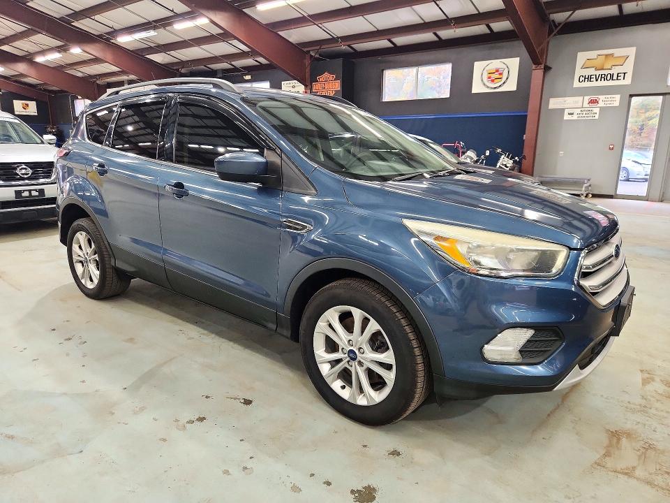 Photo 4 from auction – 2018 FORD ESCAPE with VIN 1FMCU9GD4JUA58214