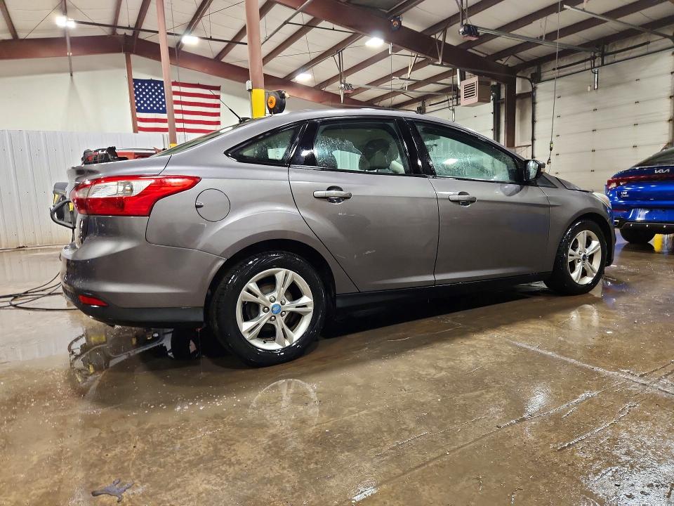 Снимка 3 от търг – 2013 FORD FOCUS с VIN 1FADP3F2XDL216326