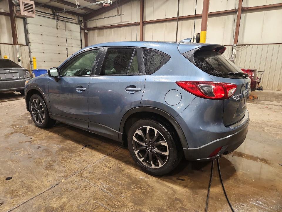 Снимка 2 от търг – 2016 MAZDA CX-5 с VIN JM3KE4DY4G0867954