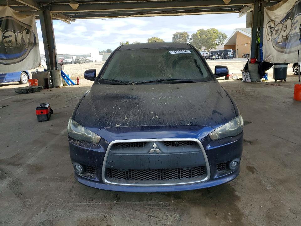 Снимка 5 от търг – 2013 MITSUBISHI LANCER с VIN JA32U8FW5DU018532
