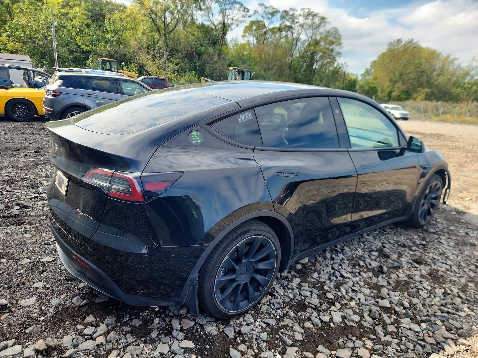 Photo 3 from auction – 2023 TESLA MODEL Y with VIN 7SAYGAEE2PF921238