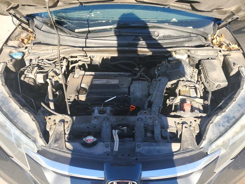 Photo 12 from auction – 2015 HONDA CR-V with VIN 2HKRM4H31FH698194