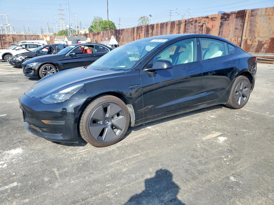 TESLA MODEL 3 2023 с VIN 5YJ3E1EA2PF496761 - Снимка от търг
