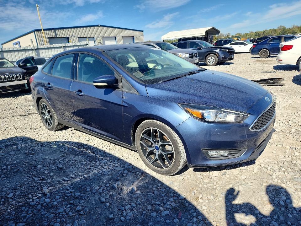 Снимка 4 от търг – 2018 FORD FOCUS с VIN 1FADP3H25JL259724