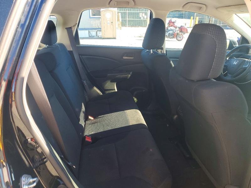 Photo 11 from auction – 2015 HONDA CR-V with VIN 2HKRM4H31FH698194