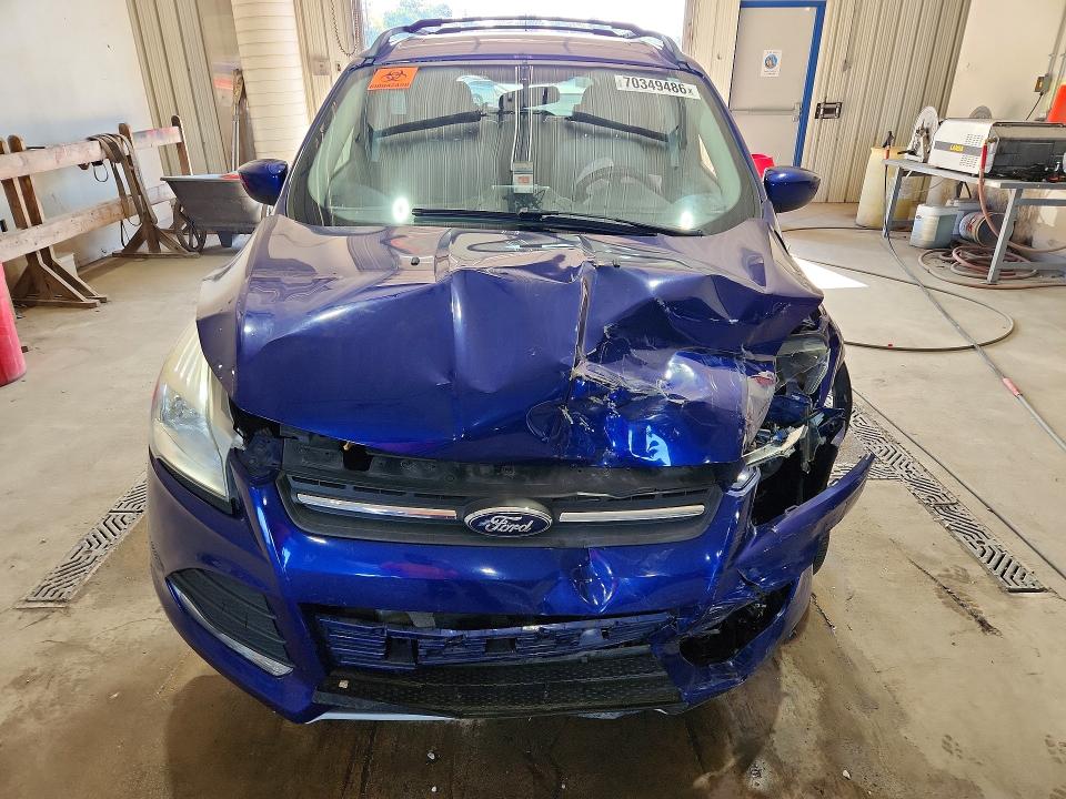 Foto 5 de la subasta – 2016 FORD ESCAPE con VIN 1FMCU9GX3GUC49724