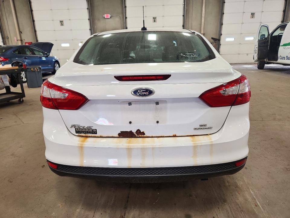 Photo 6 from auction – 2014 FORD FOCUS with VIN 1FADP3F29EL299989