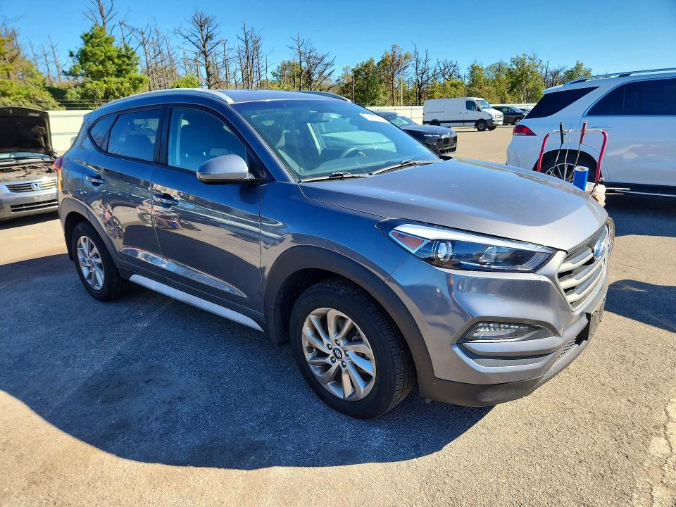 Photo 4 from auction – 2017 HYUNDAI TUCSON with VIN KM8J3CA4XHU509348