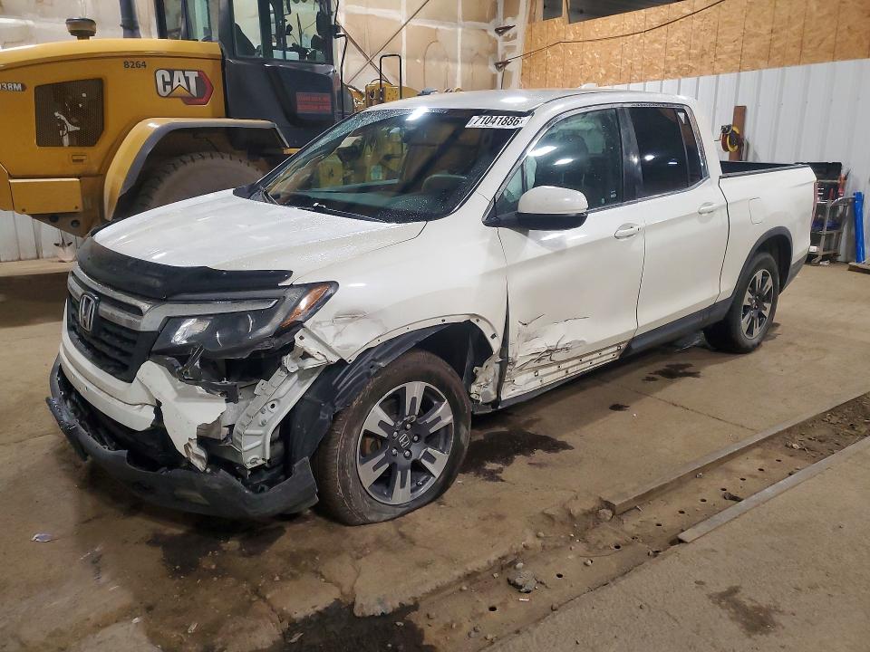HONDA RIDGELINE 2017 with VIN 5FPYK3F60HB030517 - Photo from auction