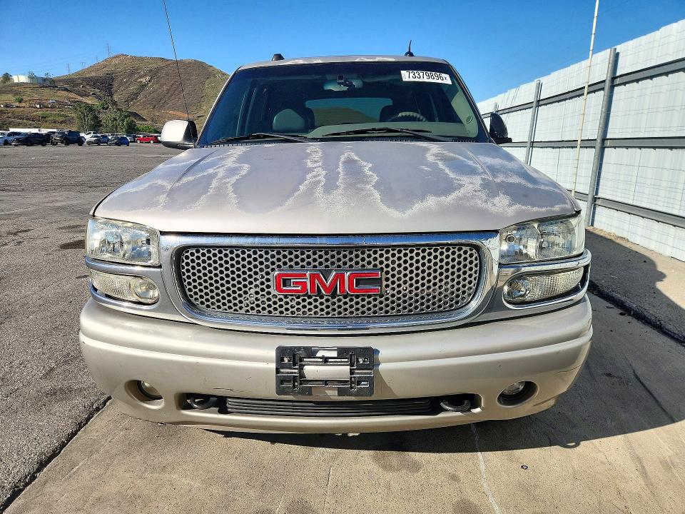 Снимка 5 от търг – 2004 GMC YUKON с VIN 1GKEK63U04J296062
