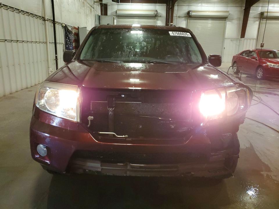 Фото 5 с аукциона – 2011 HONDA PILOT с VIN 5FNYF4H47BB072480