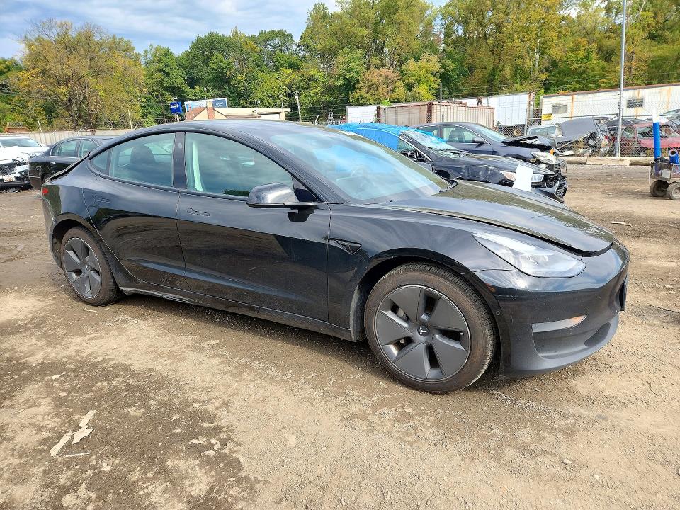 Снимка 4 от търг – 2021 TESLA MODEL 3 с VIN 5YJ3E1EA3MF028467