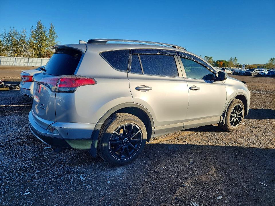Снимка 3 от търг – 2017 TOYOTA RAV4 HYBRID с VIN JTMRJREV3HD091461