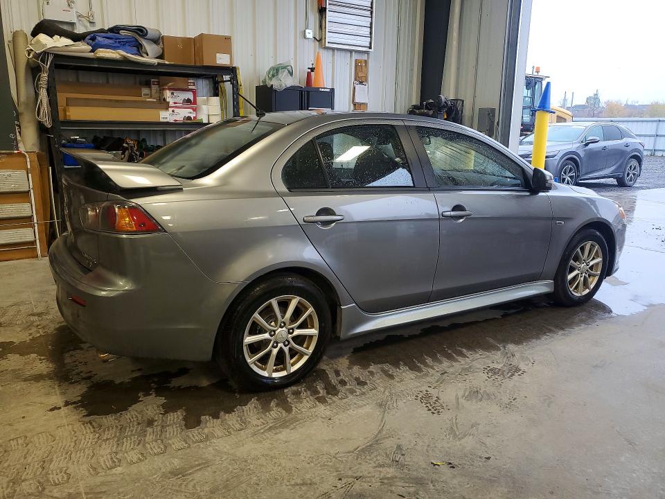 Снимка 3 от търг – 2015 MITSUBISHI LANCER с VIN JA32U2FU9FU601829