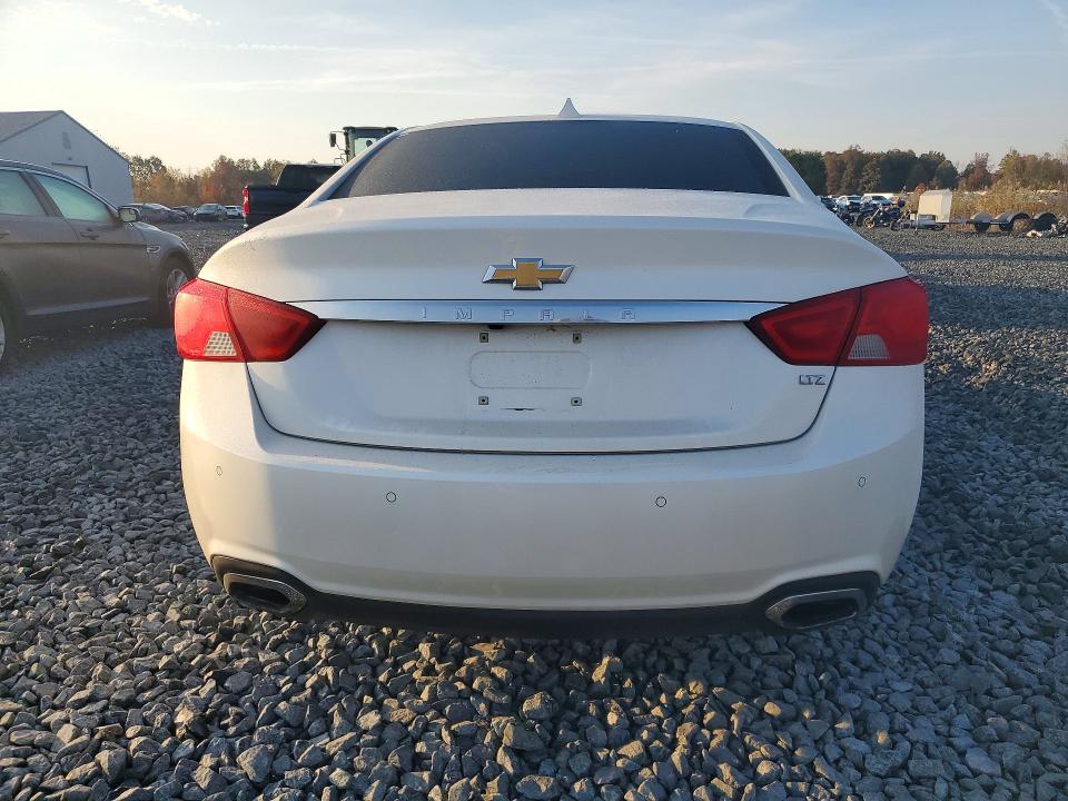 Снимка 6 от търг – 2014 CHEVROLET IMPALA с VIN 1G1155S33EU116439