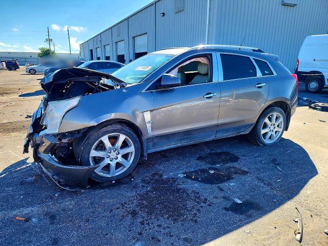 CADILLAC SRX 2011 with VIN 3GYFNBEY2BS655918 - Photo from auction