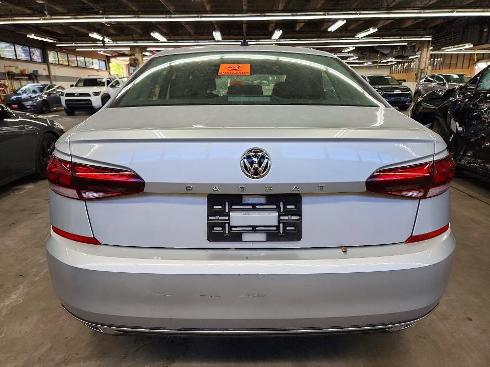 Снимка 6 от търг – 2021 VOLKSWAGEN PASSAT с VIN 1VWAA7A34MC007702