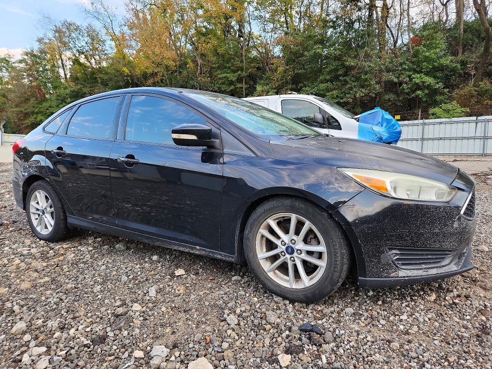 Снимка 4 от търг – 2016 FORD FOCUS с VIN 1FADP3F20GL395268