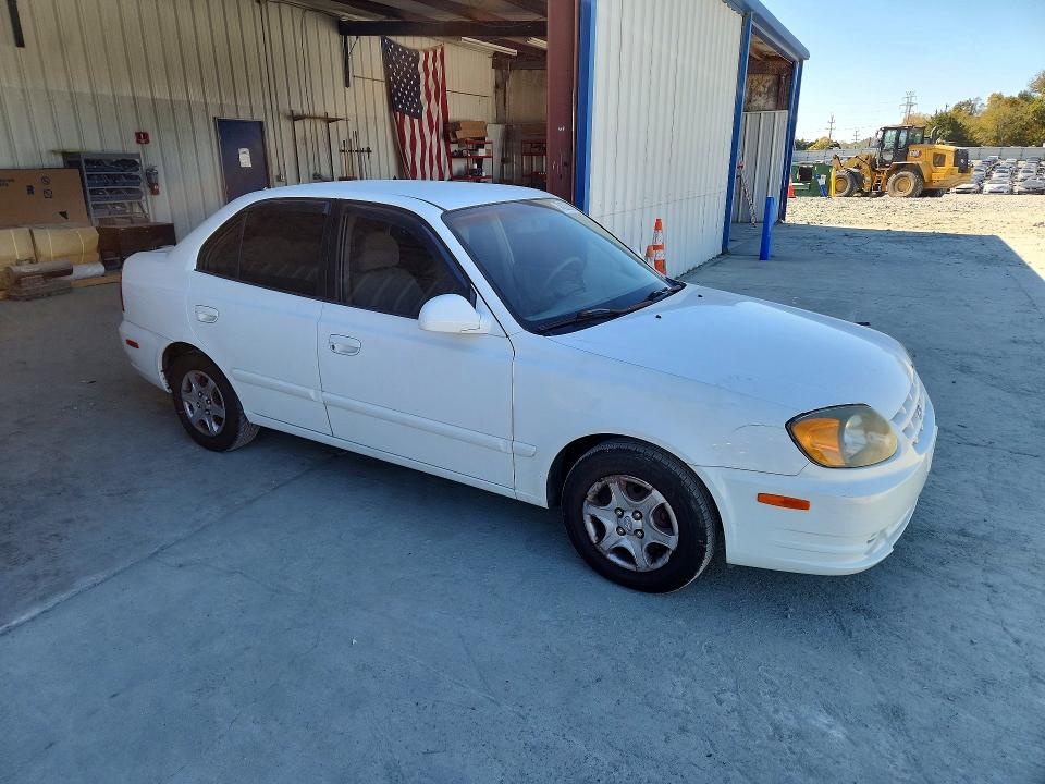 Photo 4 from auction – 2004 HYUNDAI ACCENT with VIN KMHCG45C84U567604