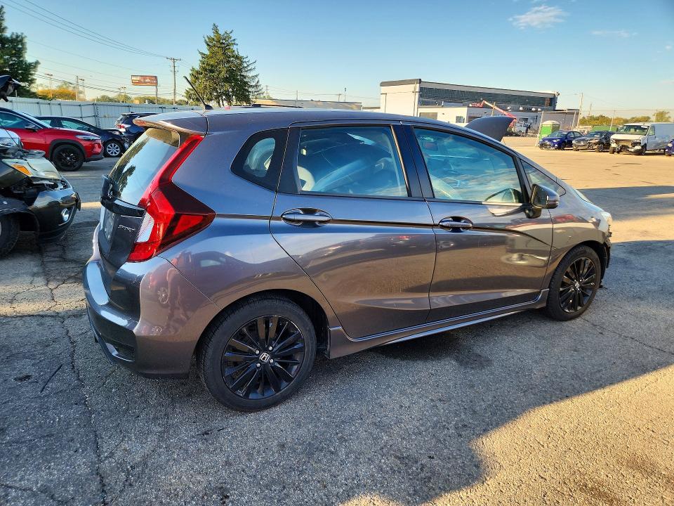 Снимка 3 от търг – 2018 HONDA FIT с VIN 3HGGK5H67JM716294