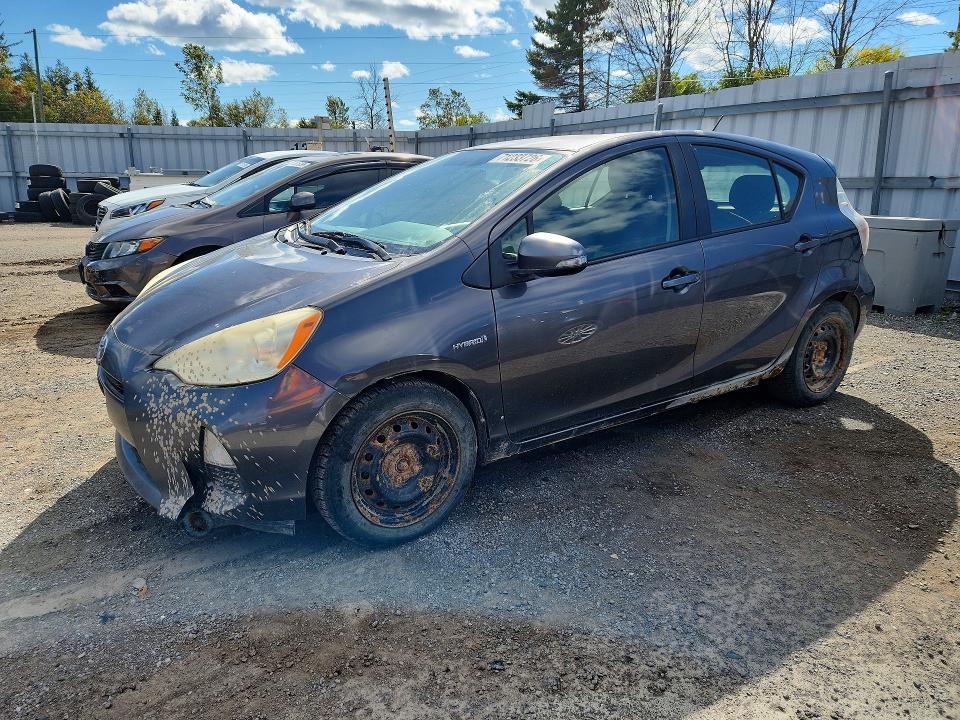 TOYOTA PRIUS C 2013 с VIN JTDKDTB31D1040819 - Снимка от търг