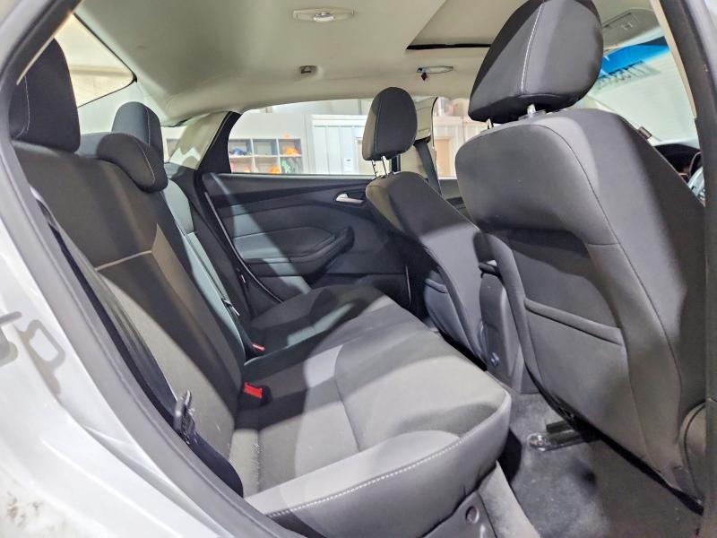 Снимка 10 от търг – 2013 FORD FOCUS с VIN 1FADP3F24DL329950