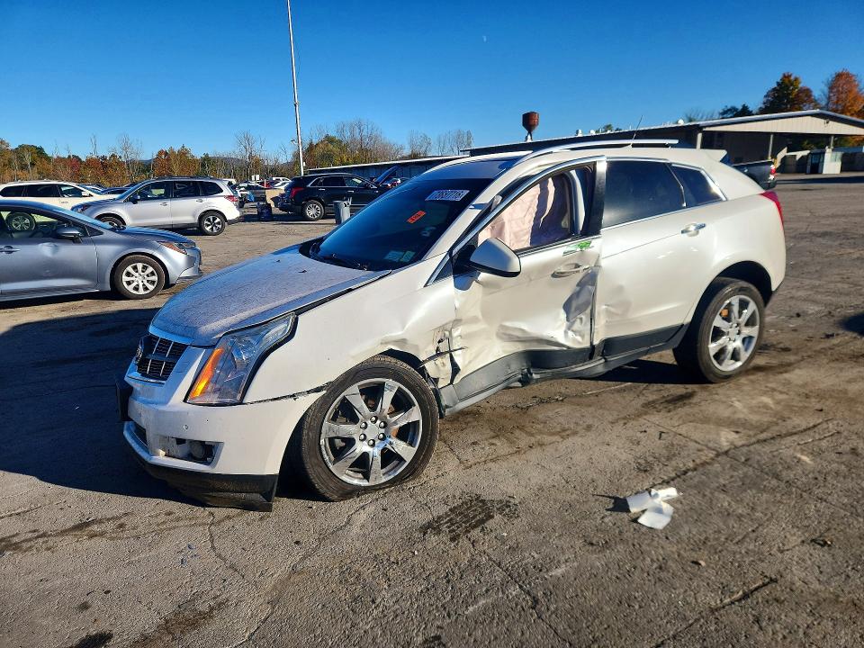 CADILLAC SRX 2011 с VIN 3GYFNEEYXBS523829 - Снимка от търг