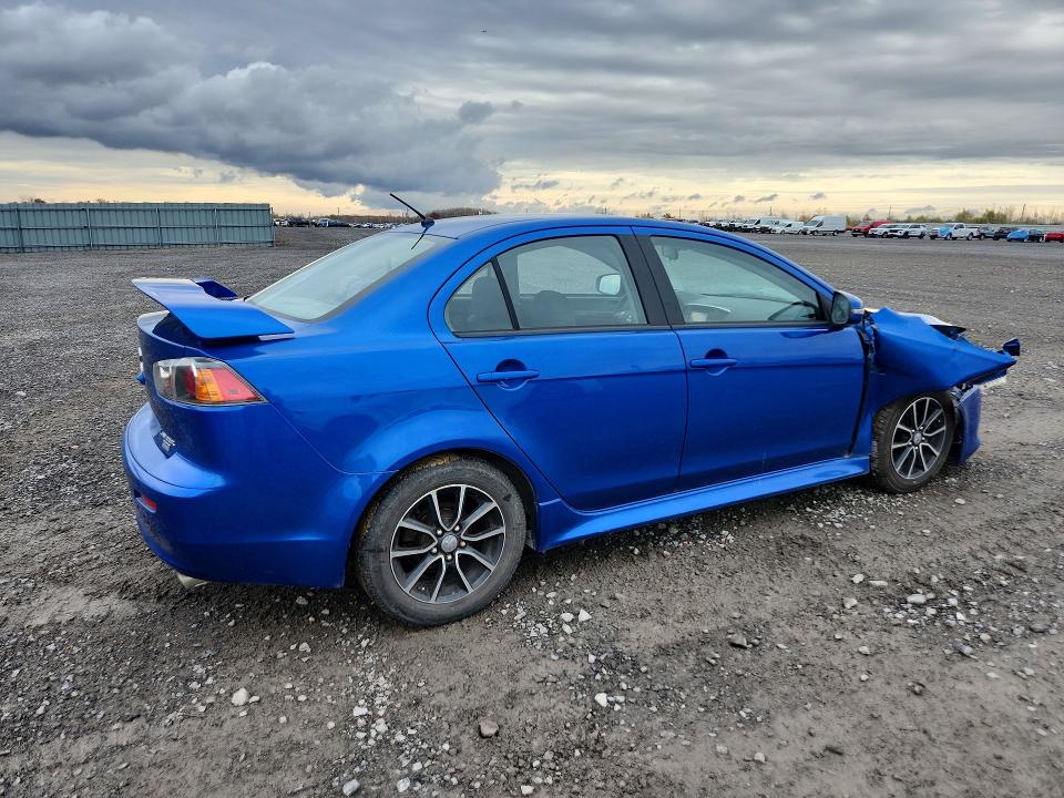 Снимка 3 от търг – 2016 MITSUBISHI LANCER с VIN JA32U2FU0GU600487
