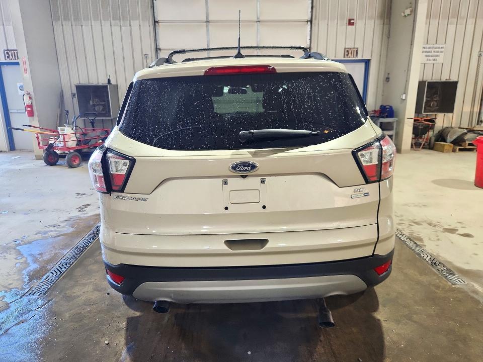 Foto 6 de la subasta – 2018 FORD ESCAPE con VIN 1FMCU9GD9JUC54424