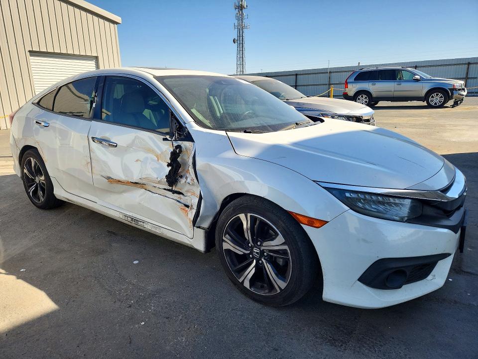 Photo 4 from auction – 2016 HONDA CIVIC with VIN 19XFC1F93GE219694