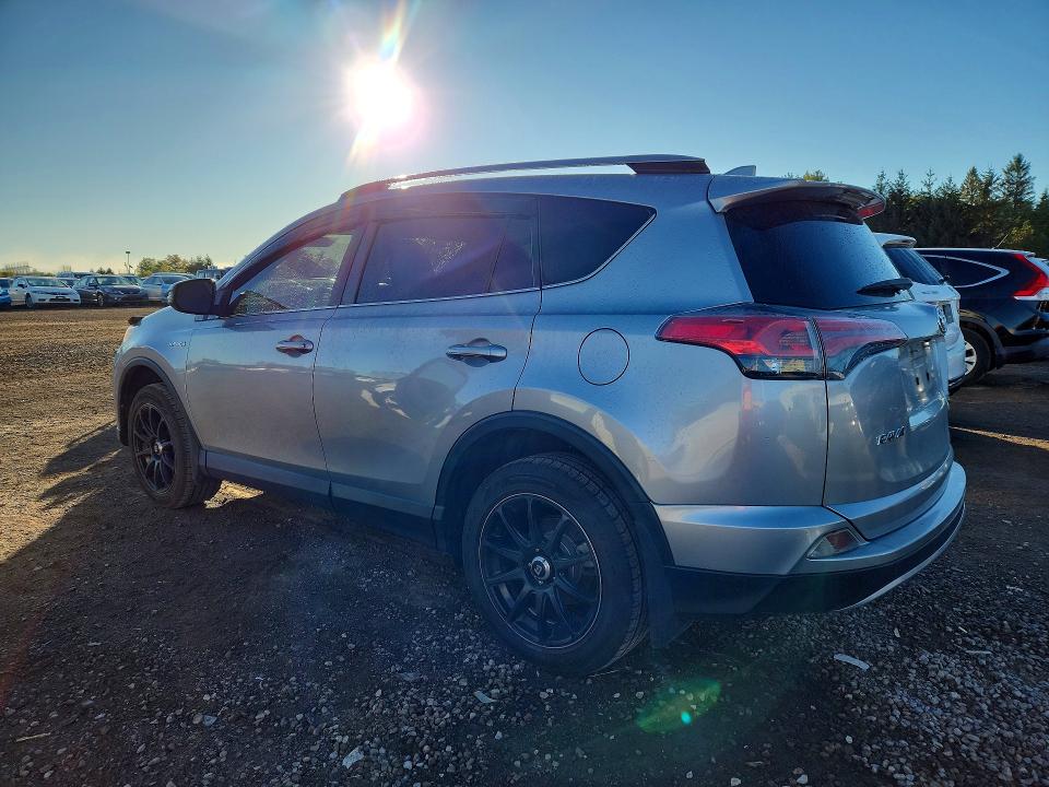 Снимка 2 от търг – 2017 TOYOTA RAV4 HYBRID с VIN JTMRJREV3HD091461