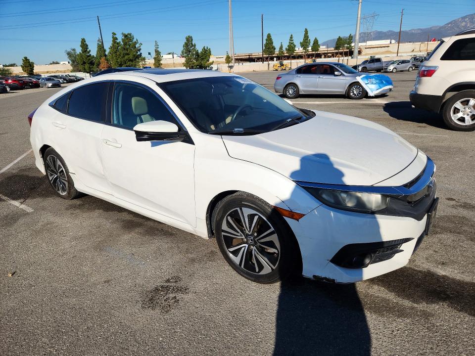 Снимка 4 от търг – 2016 HONDA CIVIC с VIN 19XFC1F74GE200652