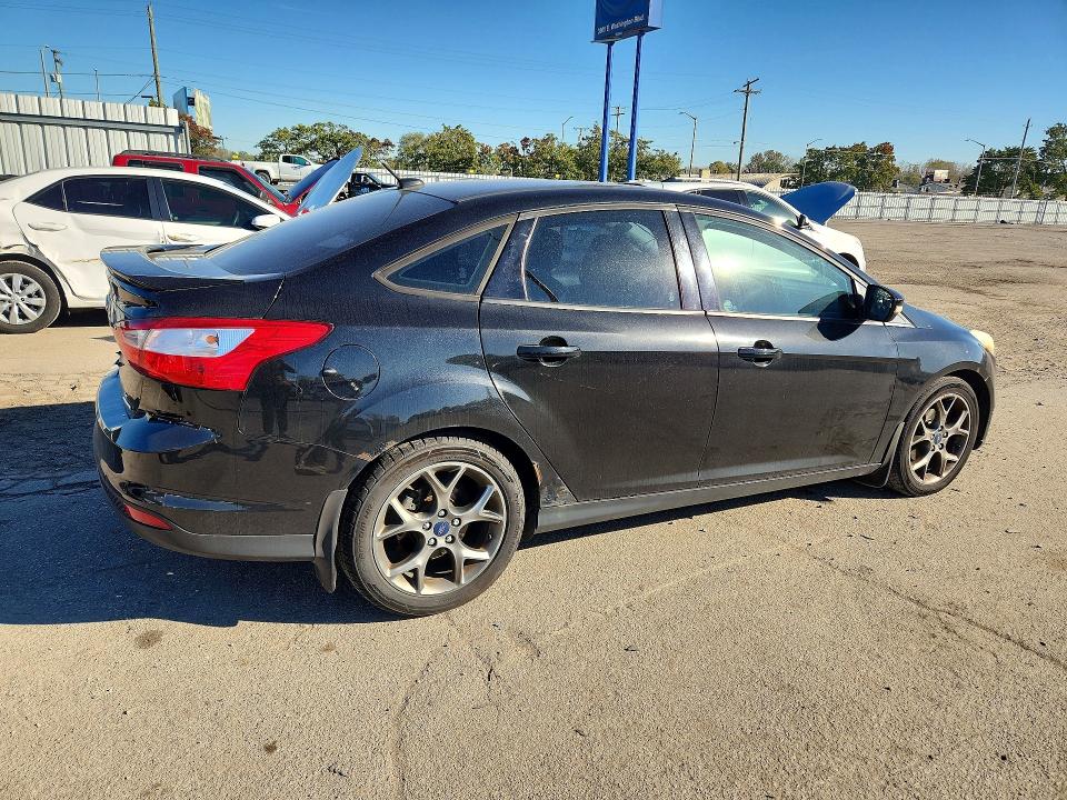 Снимка 3 от търг – 2013 FORD FOCUS с VIN 1FADP3F25DL287109