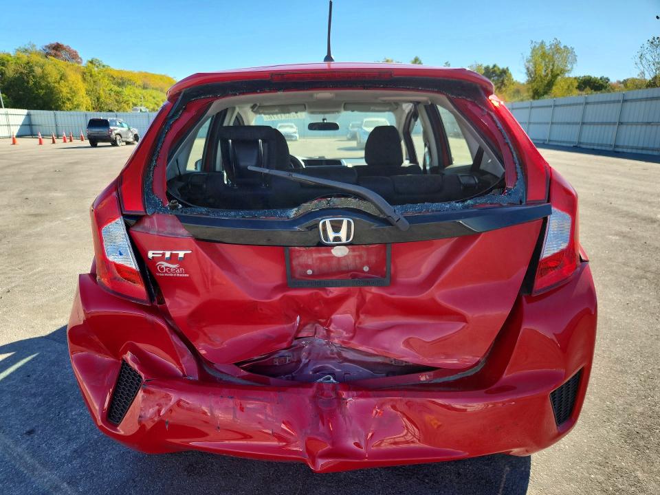 Снимка 6 от търг – 2016 HONDA FIT с VIN JHMGK5H59GS009749