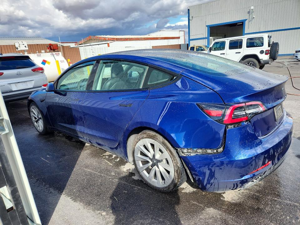 Снимка 2 от търг – 2022 TESLA MODEL 3 с VIN 5YJ3E1EA9NF368644