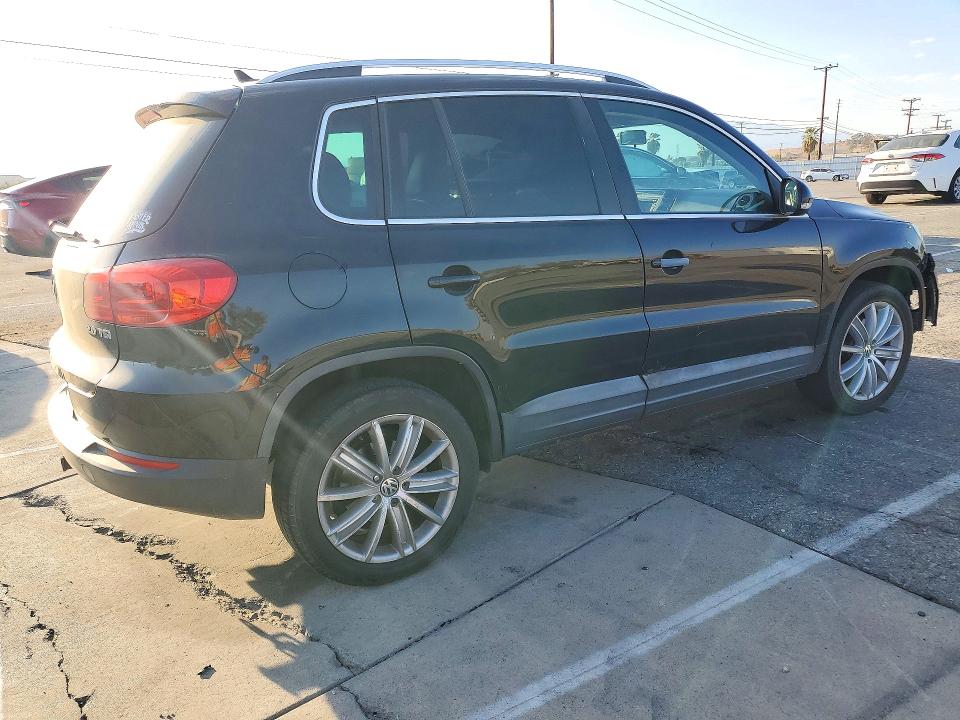 Снимка 3 от търг – 2012 VOLKSWAGEN TIGUAN с VIN WVGAV7AX8CW510331