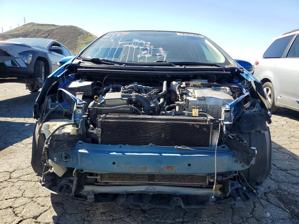 Снимка 5 от търг – 2015 TOYOTA PRIUS C с VIN JTDKDTB3XF1092596