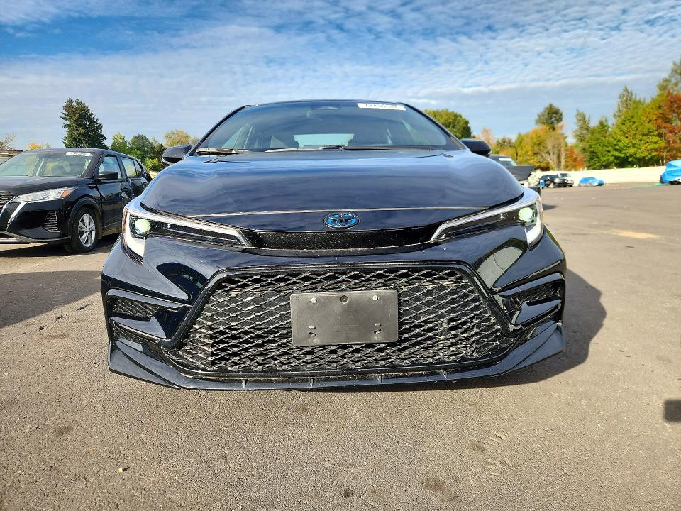 Снимка 5 от търг – 2024 TOYOTA COROLLA HYBRID с VIN JTDBDMHEXR3009563