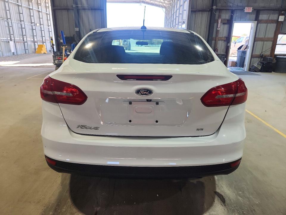 Foto 6 de la subasta – 2018 FORD FOCUS con VIN 1FADP3F28JL230091