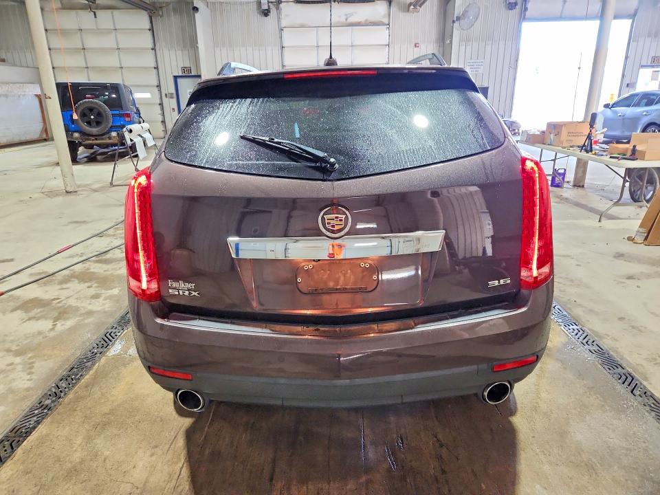 Снимка 6 от търг – 2016 CADILLAC SRX с VIN 3GYFNCE37GS515171