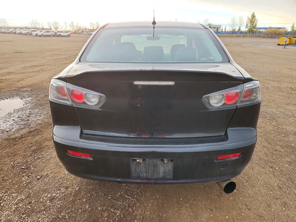 Снимка 6 от търг – 2013 MITSUBISHI LANCER с VIN JA32U2FU2DU606738