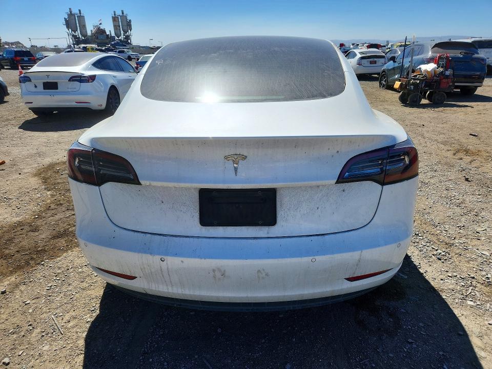 Снимка 6 от търг – 2019 TESLA MODEL 3 с VIN 5YJ3E1EA5KF482474
