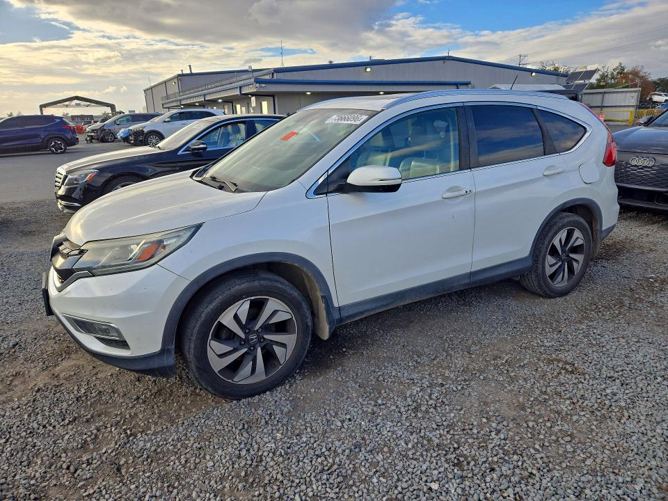 HONDA CR-V 2015 with VIN 5J6RM3H99FL011127 - Photo from auction