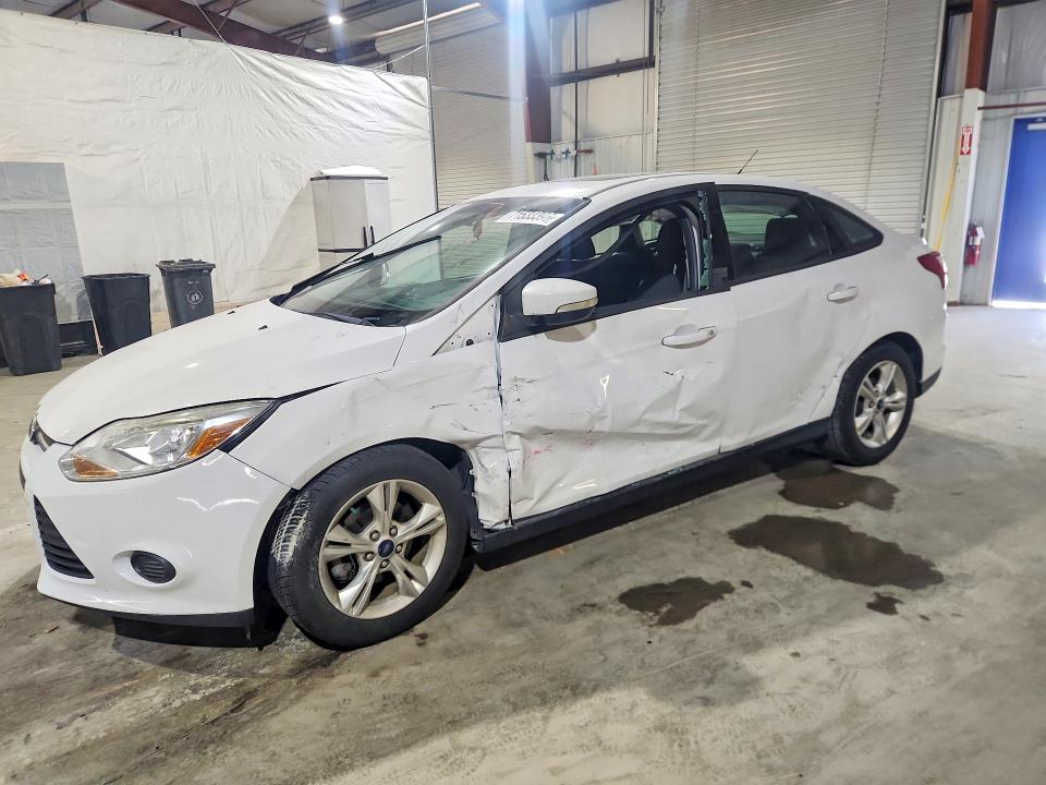 FORD FOCUS 2013 с VIN 1FADP3F24DL329950 - Снимка от търг